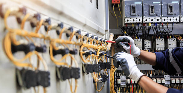 Professional Electrician technician working in Norwalk, IA